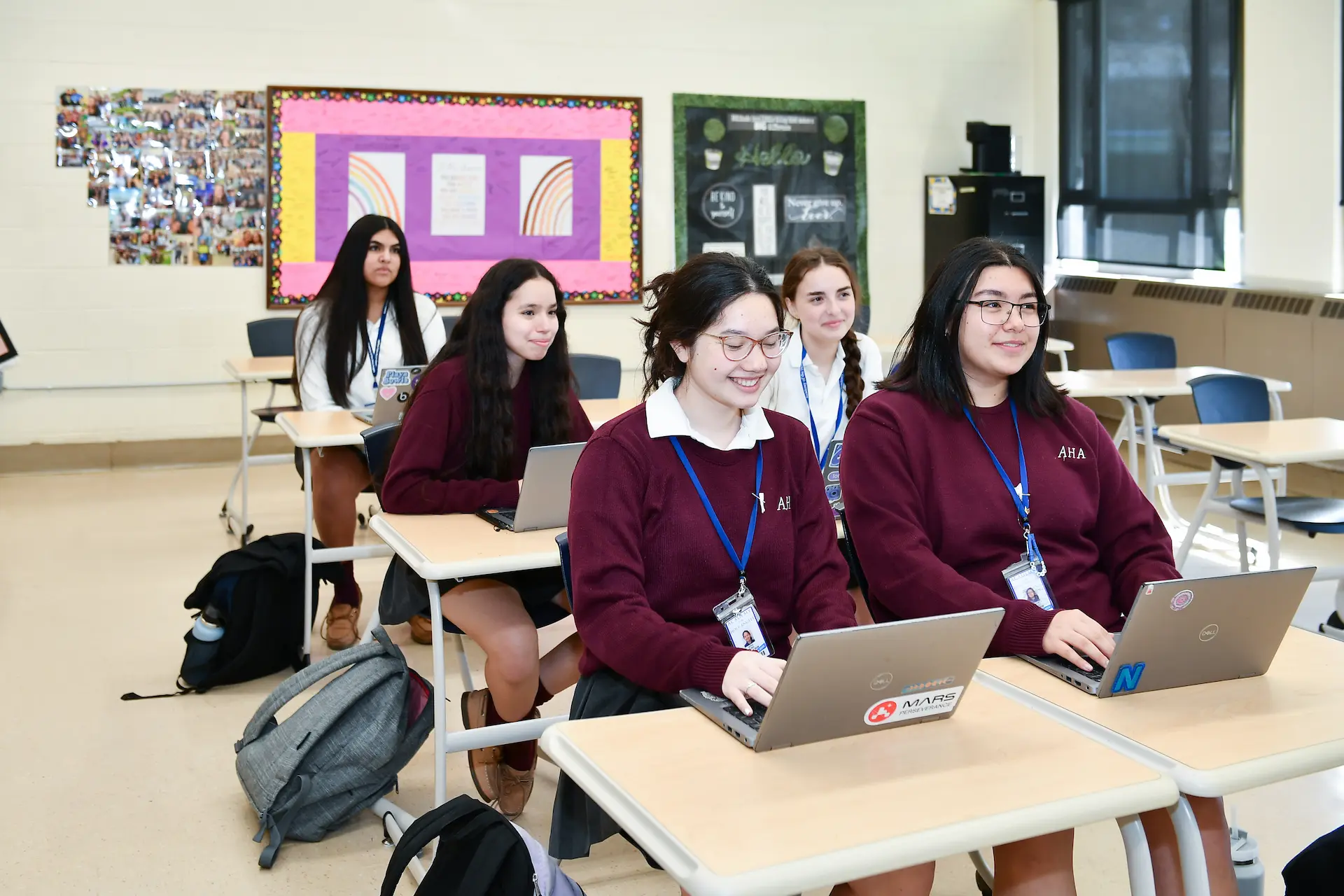 Girls in a classroom whose parents asked how to choose the right high school for my daughter